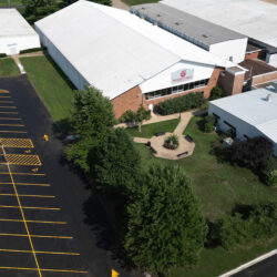 Exterior aerial of Parkside Fitness entrance and parking lot.